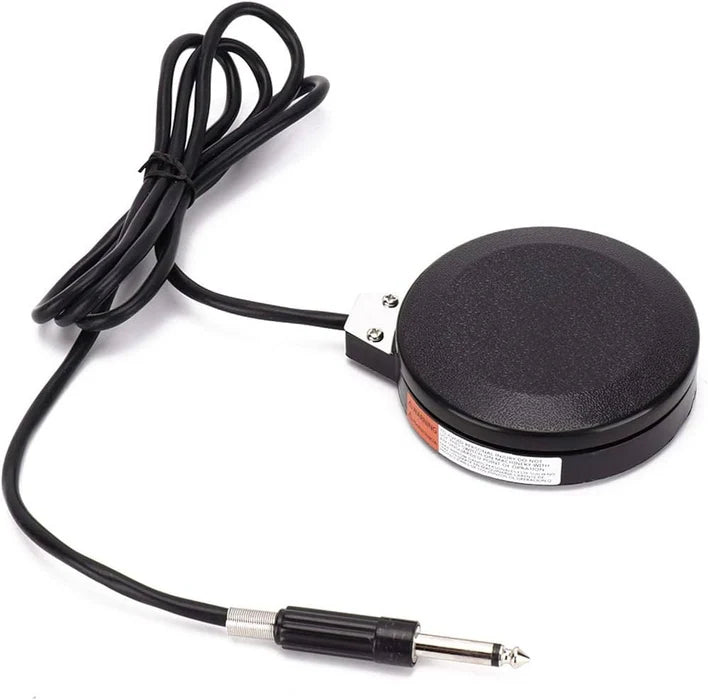 Pedal negro redondo de pie para máquina